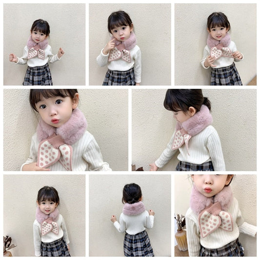 Close-up of a soft faux fur baby neck scarf in beige, for winter warmth, infant apparel