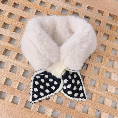 Toddler wearing a cute pink faux fur neck scarf, children's winter fashion accessory