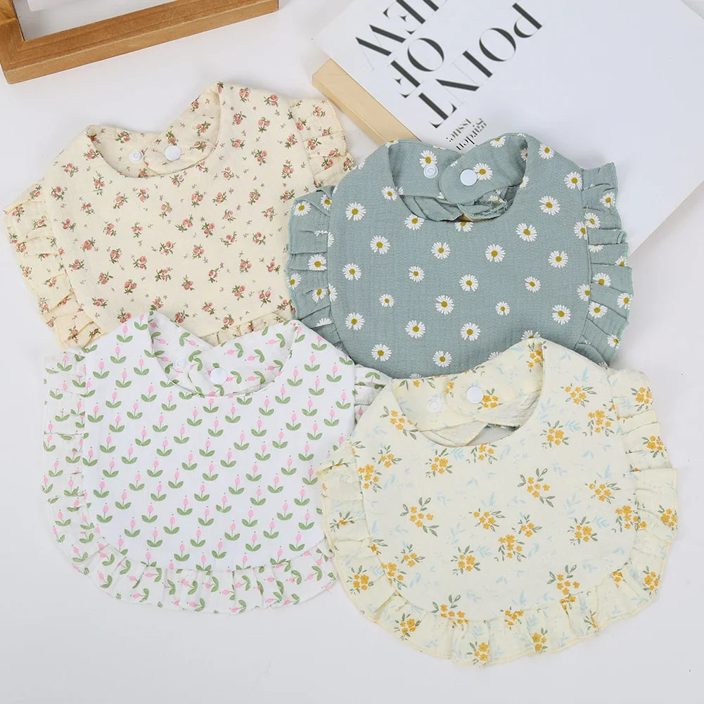 Set of three assorted floral print cotton bandana bibs for baby girls and boys feeding