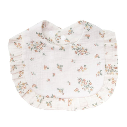 Stack of multiple unisex floral print cotton bandana bibs for baby shower gift
