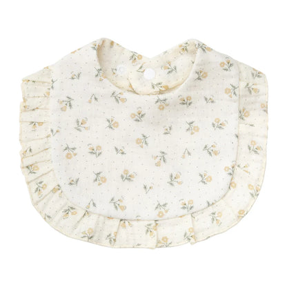 Baby's feeding scarf: a charming floral print cotton bandana bib on a wooden surface