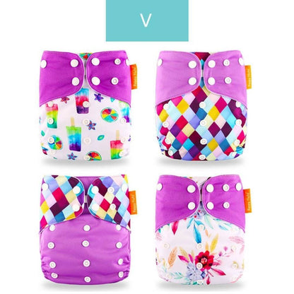 Bundle of wash-day essentials: eco-friendly reusable cloth diapers, detergent, and a wet bag for infants.
