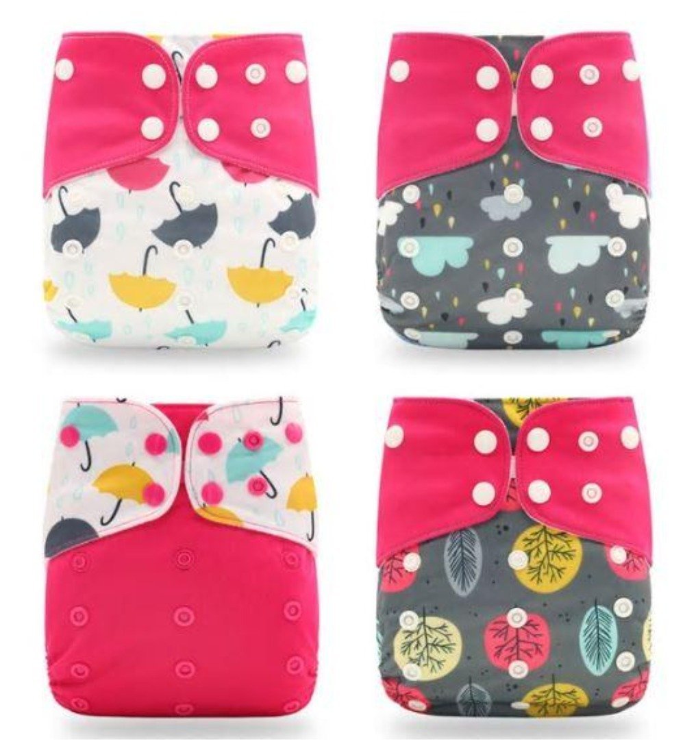 Open cloth diaper showing the inner lining and insert, designed for leak-proof protection and easy cleaning for infants.