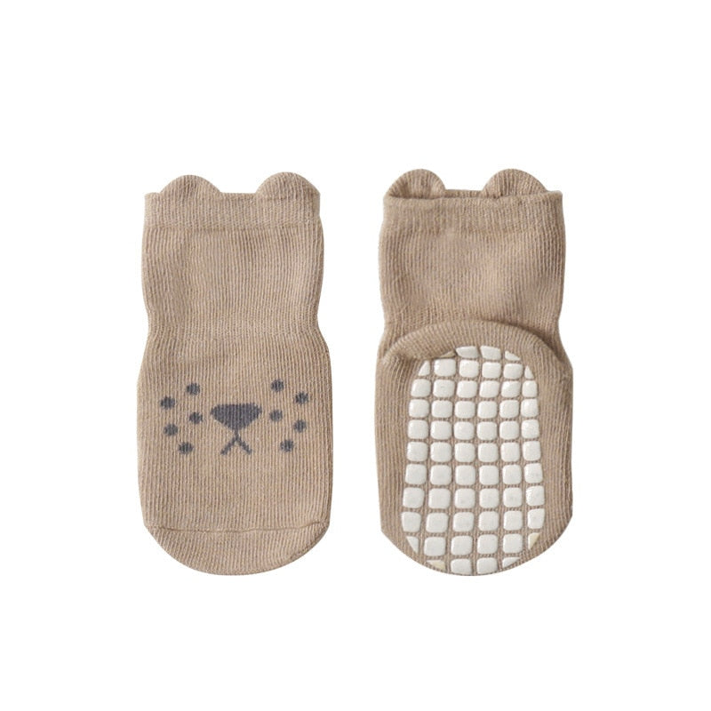 Zoomed-in texture of combed cotton non-slip baby socks, highlighting quality material for infant apparel