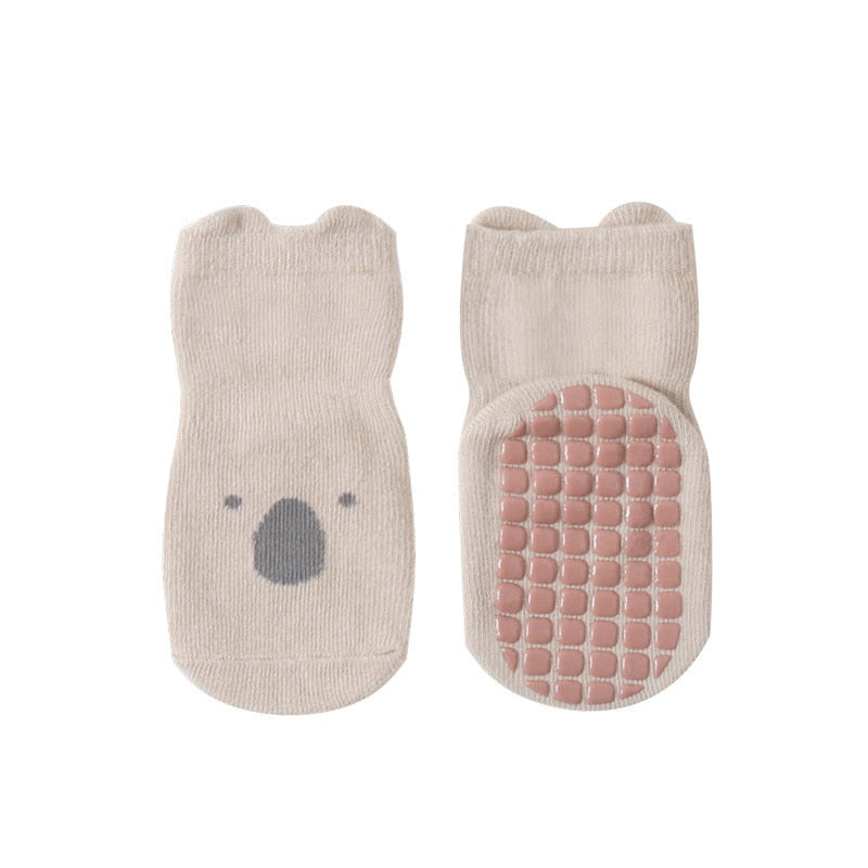 A pair of warm non-slip combed cotton toddler socks, great for keeping baby's feet secure and comfortable