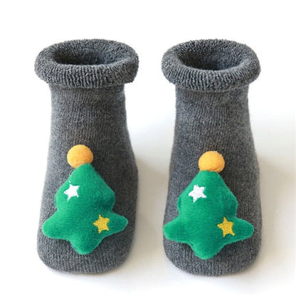 Holiday-themed anti-slip baby socks, made from soft cotton for ultimate comfort and warmth.
