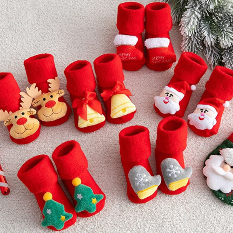 Soft cotton anti-slip Christmas socks for baby, featuring a cute holiday design for winter wear.