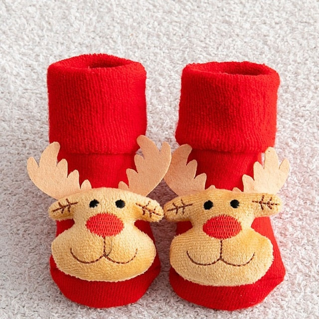 Toddler-sized anti-slip Christmas socks in a vibrant red, showcasing a fun holiday pattern.