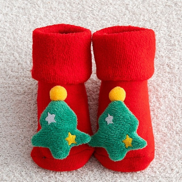 Comfortable cotton baby Christmas socks with anti-slip dots on the sole, great for winter babies.