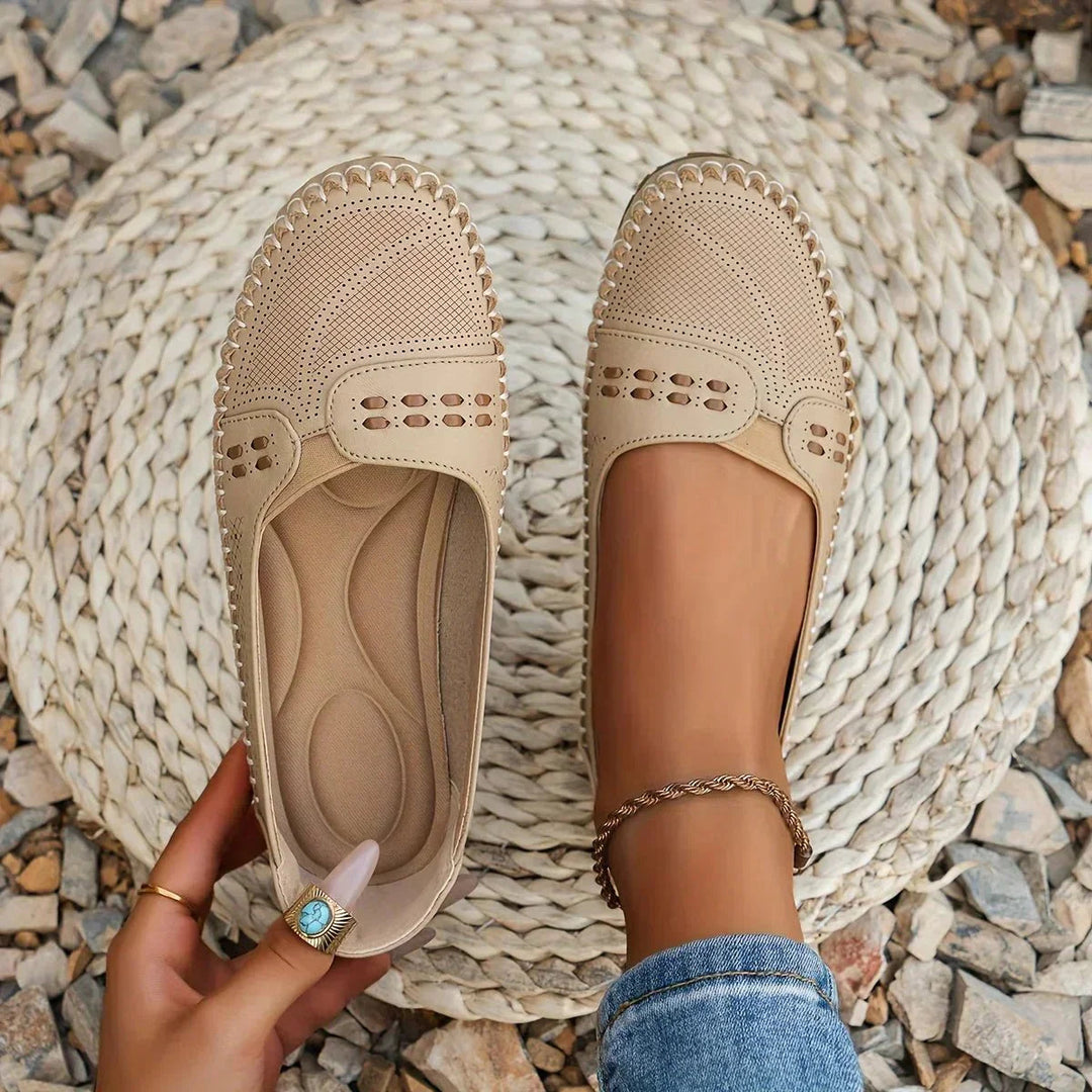 Close-up of perforated design on women's orthopedic loafers for comfortable everyday wear.