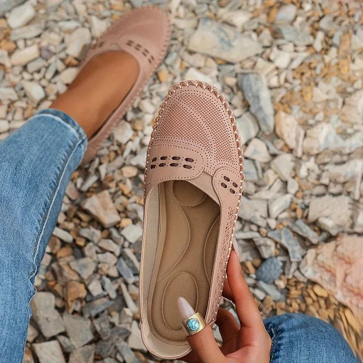 Perforated women's slip-on loafers, excellent for casual wear, workplace comfort & spring style.