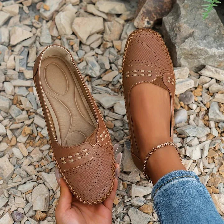 Side view of women's orthopedic loafer, highlighting ergonomic design & slip-on convenience.