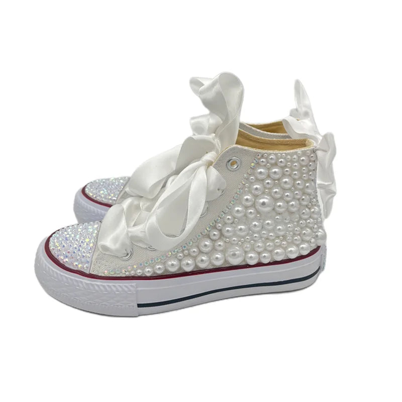 Chic cotton glitter Mary Jane shoes for toddler girls, designed with a classic bow and easy-to-wear strap.