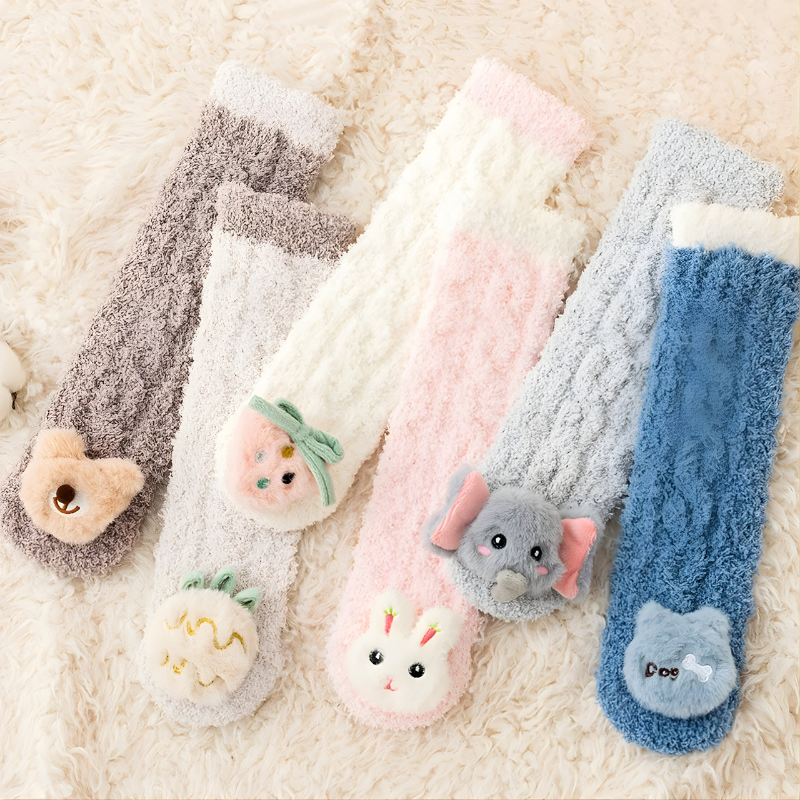 Close-up of plush lamb's wool baby winter socks, ideal for infant comfort and warmth.