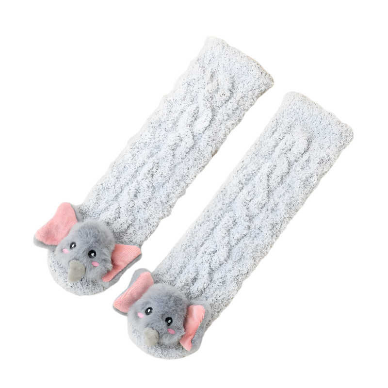 Textured image of a single plush lamb's wool baby sock, highlighting its warmth and softness.