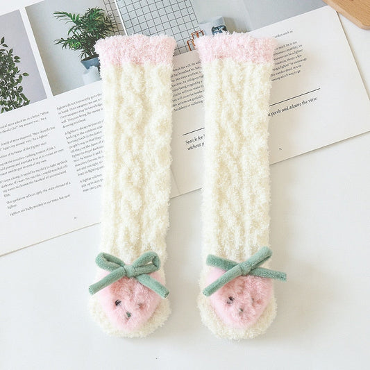 Close-up of three pairs of colorful cotton baby animal cartoon socks for infants & toddlers