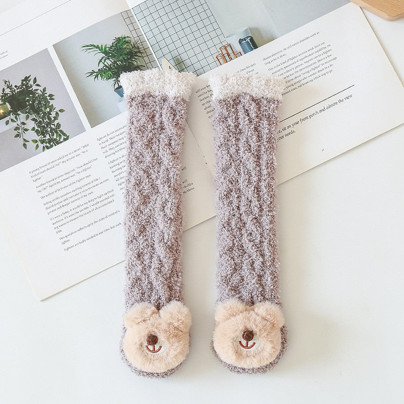 Collection of vibrant animal-themed cotton toddler socks with various cartoon designs