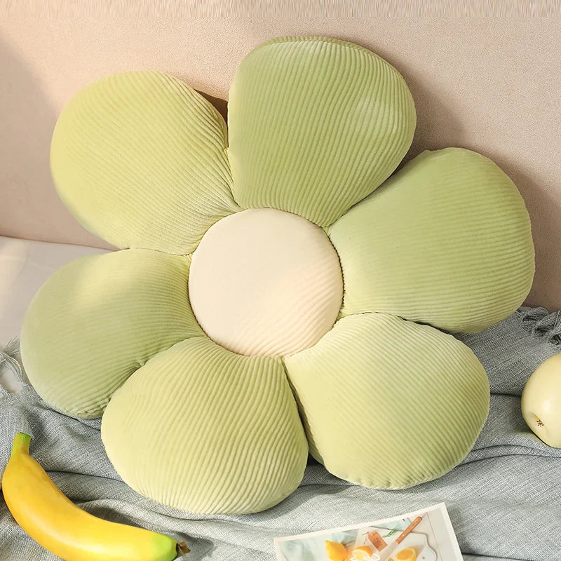 Soft and cuddly sunflower pillow, a joyful decorative accent for your cozy home.