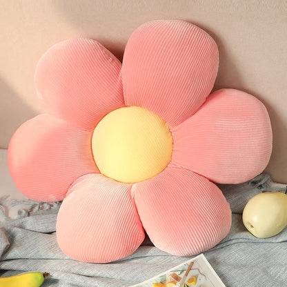Decorative sunflower stuffed pillow, a soft and inviting accent for any sofa or bed.