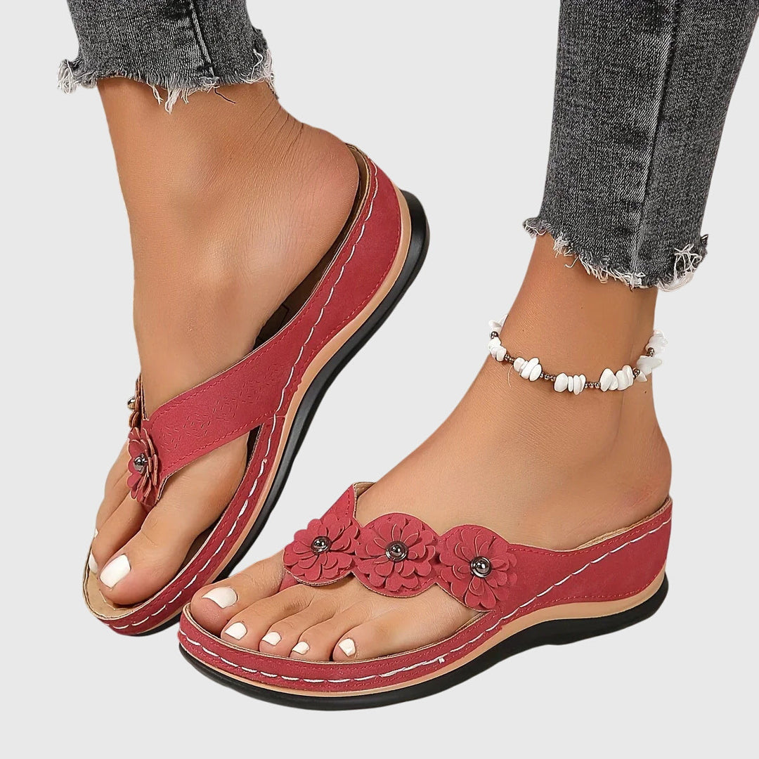 Pair of women's arch support sandals, comfortable for summer, beachwear & casual outings, with shock absorption.