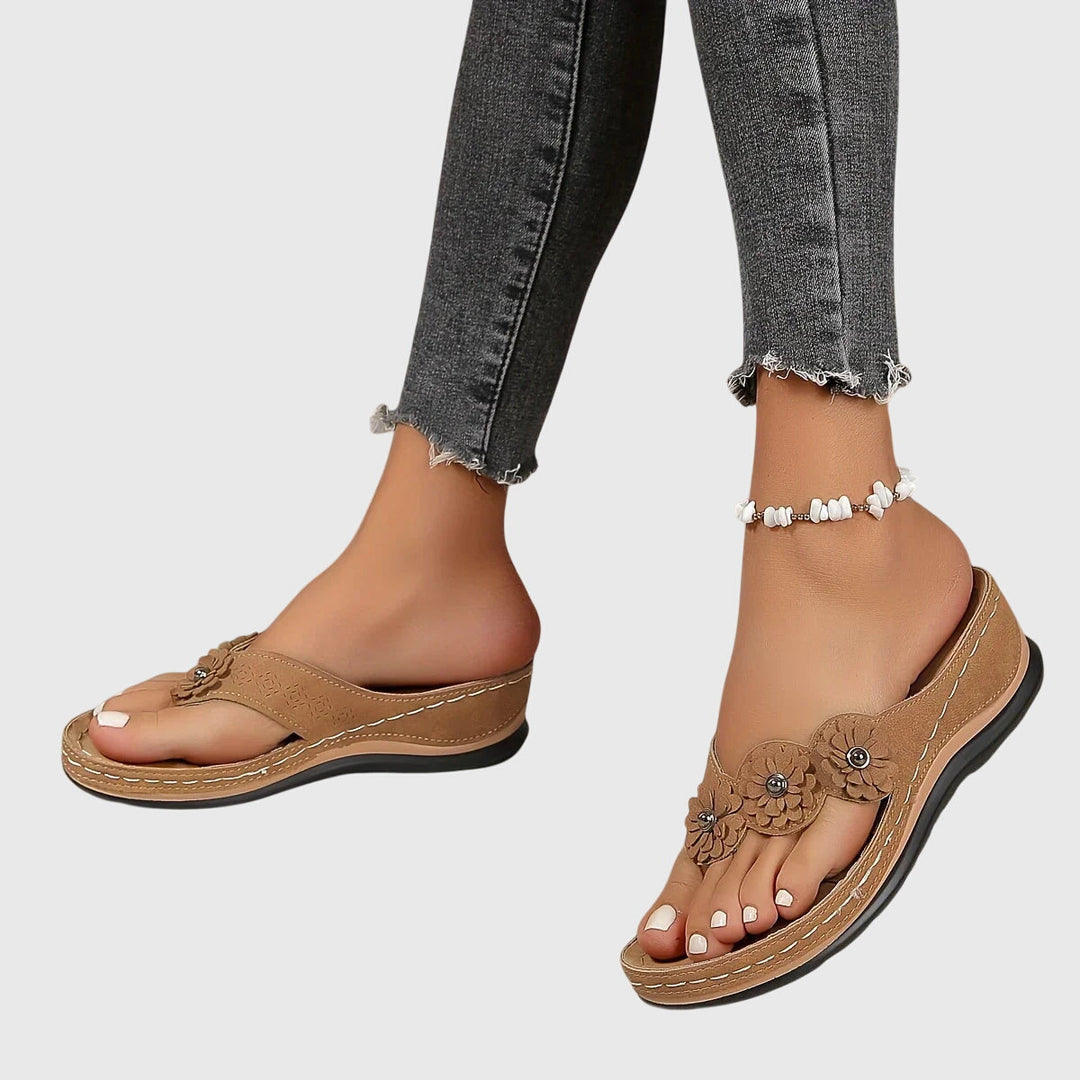 Shock-absorbing women's flip flops with arch support, great for summer, beach, and everyday comfortable walking.
