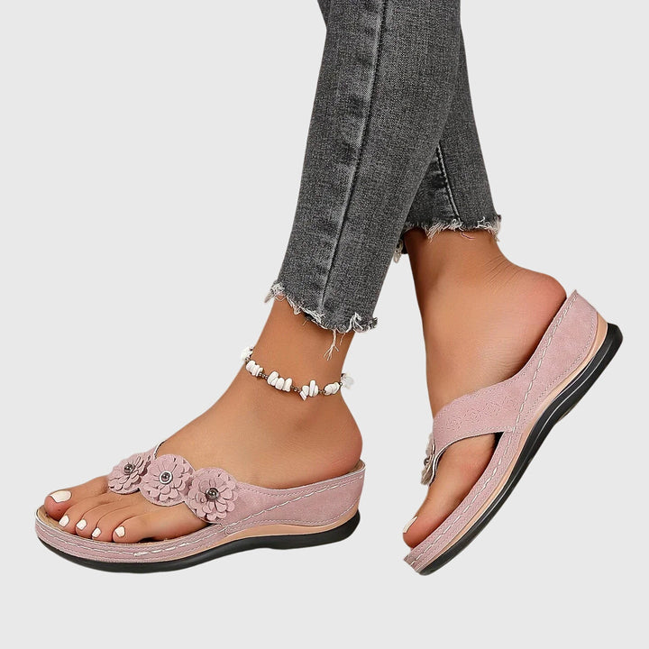 High-quality women's orthopedic arch support flip flops, offering foot relief and all-day comfort for active wear.