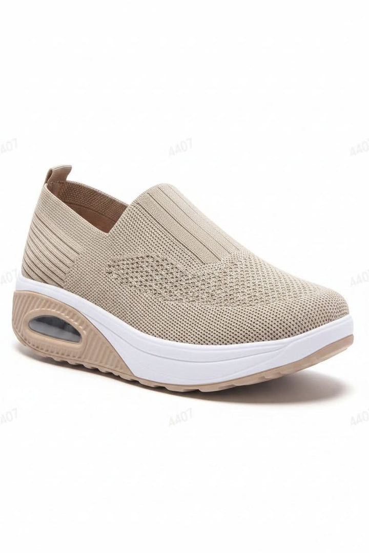 Women's supportive walking shoes in a neutral color, great for everyday wear & pain relief.