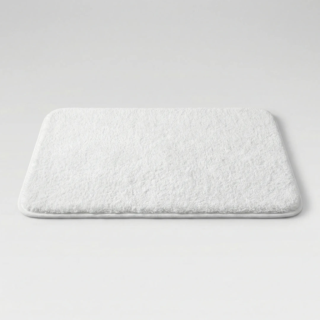 Flowique Statement Area Rug, extra thick and soft bath mat with elegant wave design, perfect home decor.