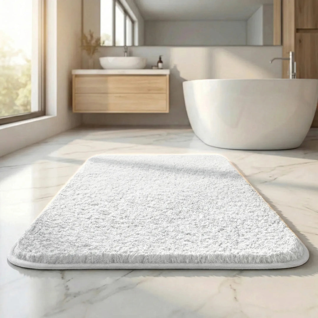 Soft, extra thick bath mat with Flowique wave design. A plush bathroom rug for stylish home decor & comfort.
