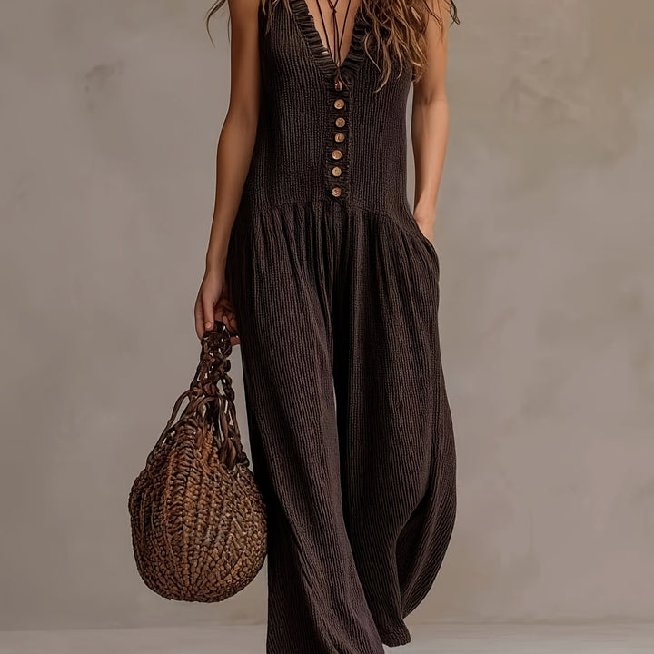 Women's coffee brown wide leg jumpsuit, a summer bohemian style with ruffle V-neck, smocked waist, and button front.