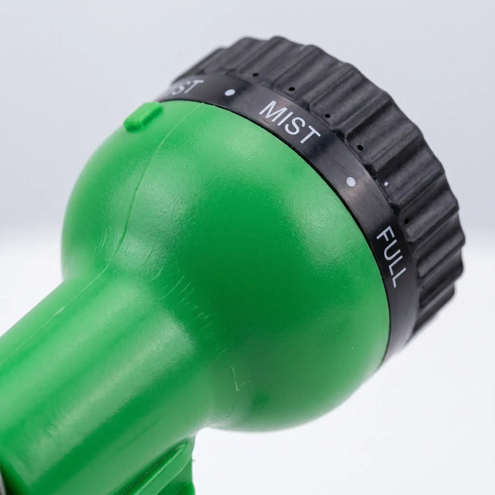 Retractable coiled garden hose ensures easy watering, tangle-free use, and compact storage for any garden.