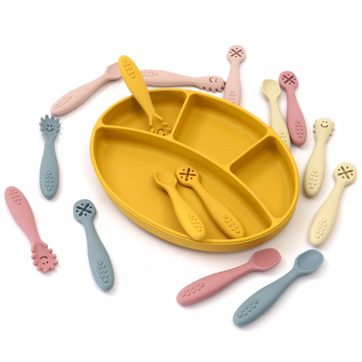 Essential baby gift: a 3-piece self-feeding silicone utensil set with a soft spoon & safe learning fork.