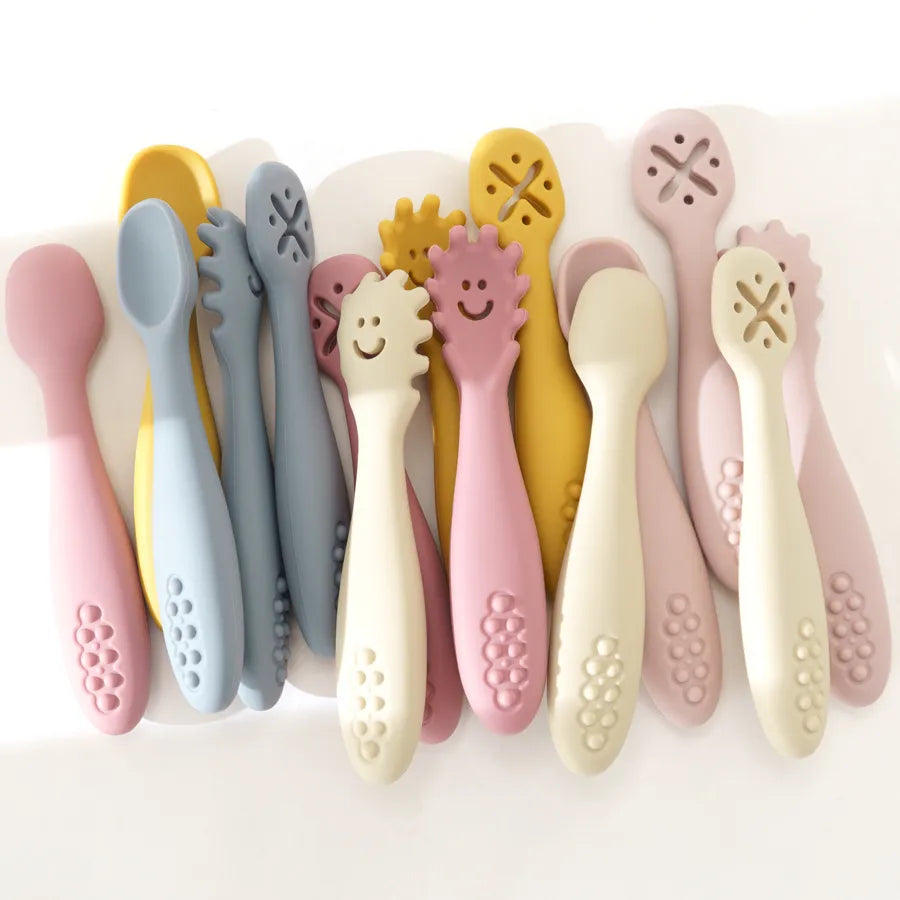 BPA-free silicone spoon and fork set, perfect for infant self-feeding & weaning. Easy grip baby utensils.