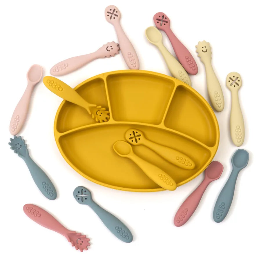 Baby's first spoon & learning fork in a durable 3-piece silicone utensil set. Ideal for toddler mealtime.