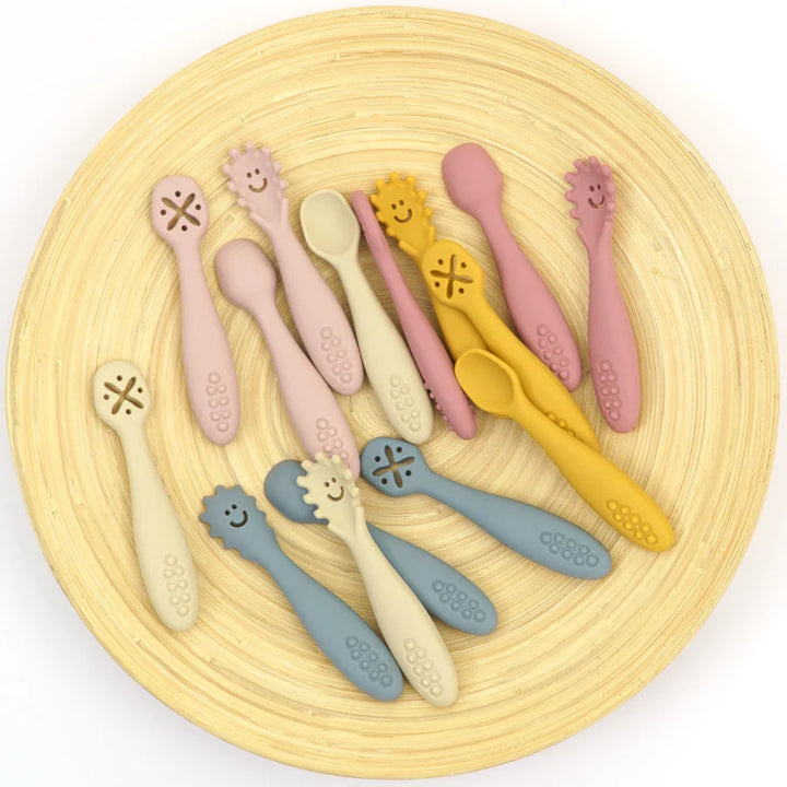 Gift-ready 3-piece silicone baby utensil set. Includes a soft spoon & child-safe learning fork for toddlers.