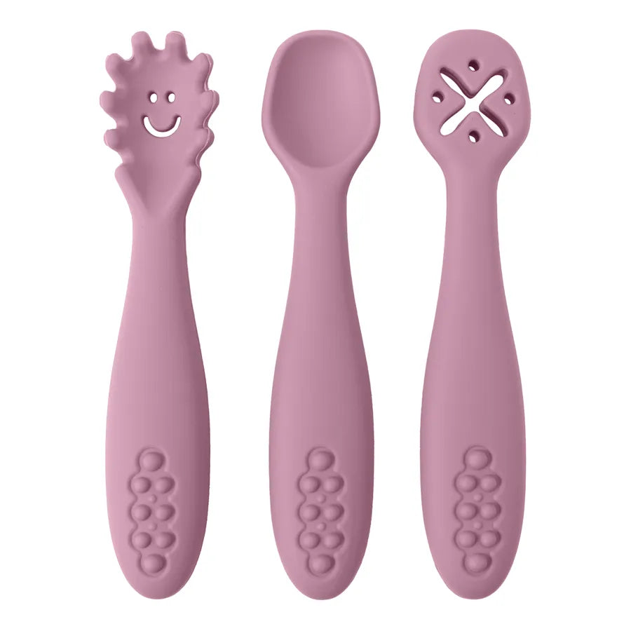 Durable and colorful baby self-feeding utensils. Soft-tip silicone spoon and easy-grip learning fork set.