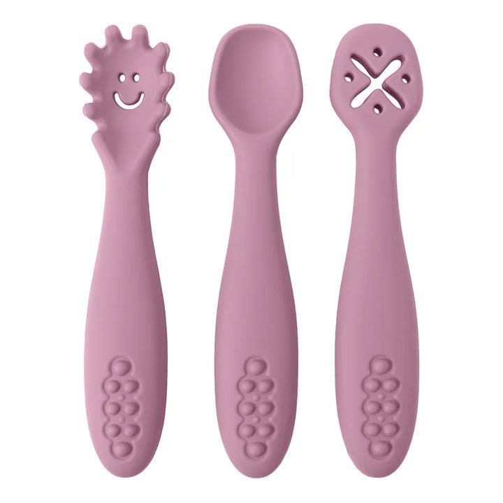 Durable and colorful baby self-feeding utensils. Soft-tip silicone spoon and easy-grip learning fork set.