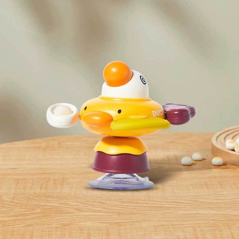 Safe and fun baby sensory toy: a bright spinner with a suction cup, offering continuous entertainment and fostering early development.