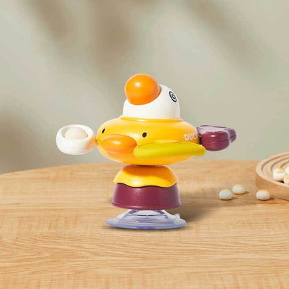 Safe and fun baby sensory toy: a bright spinner with a suction cup, offering continuous entertainment and fostering early development.