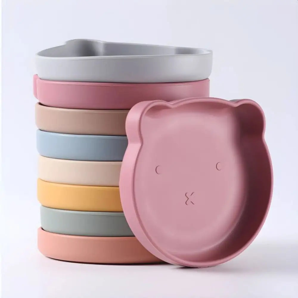 Colorful BPA-free silicone baby tableware set with cartoon animal design for self-feeding toddlers.
