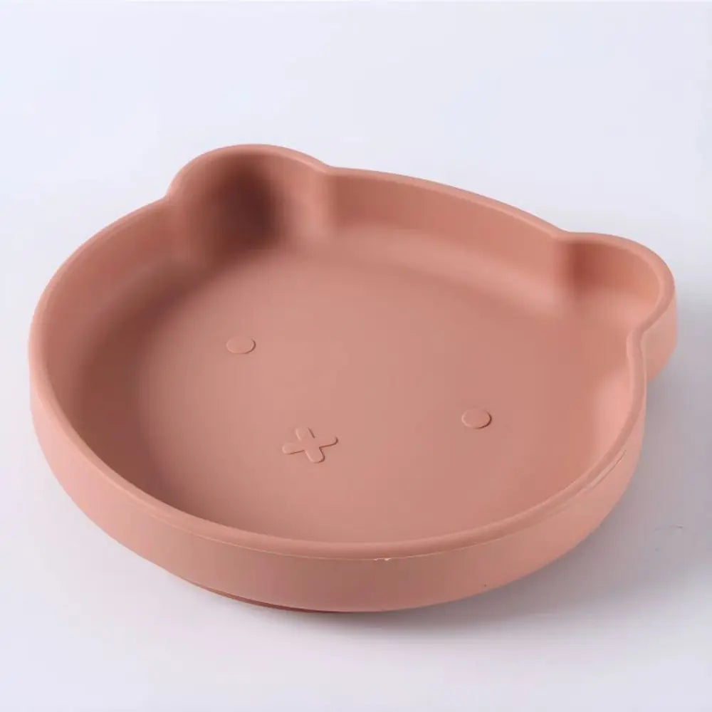 Baby cartoon silicone plate with suction, matching bowl & utensils for toddlers' feeding independence.