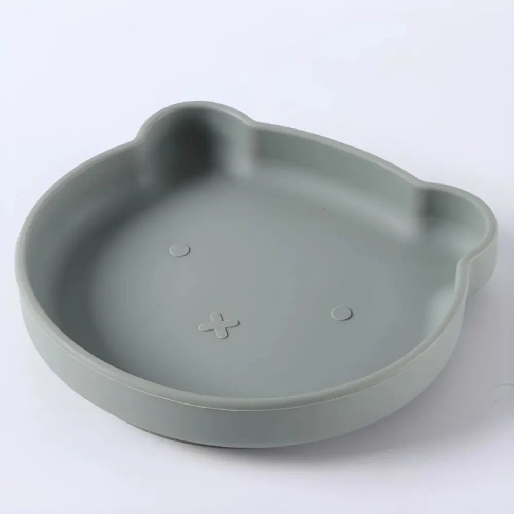 Complete nursing and feeding set: soft silicone plate, bowl & cutlery, designed for baby learning.