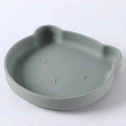 Complete nursing and feeding set: soft silicone plate, bowl & cutlery, designed for baby learning.