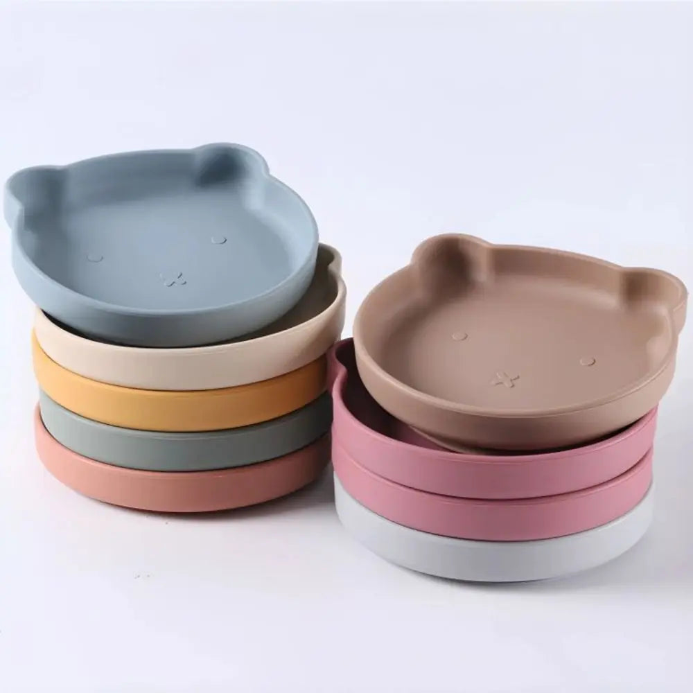 Kids' mealtime fun with this BPA-free silicone baby feeding set: plate, bowl, spoon, fork.