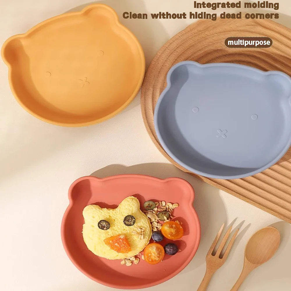 Toddler cartoon silicone dinnerware set, BPA-free, promoting self-feeding & fun mealtimes.