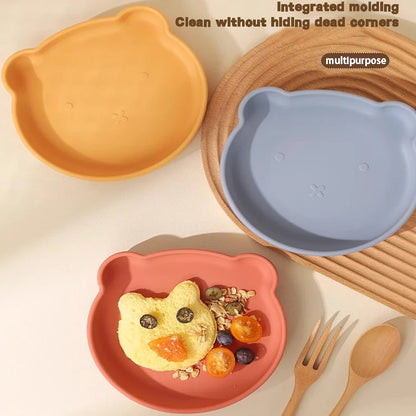 Toddler cartoon silicone dinnerware set, BPA-free, promoting self-feeding & fun mealtimes.