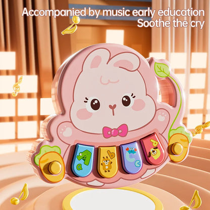 Toddler playing with an animal-themed musical piano toy, pressing a bright button.