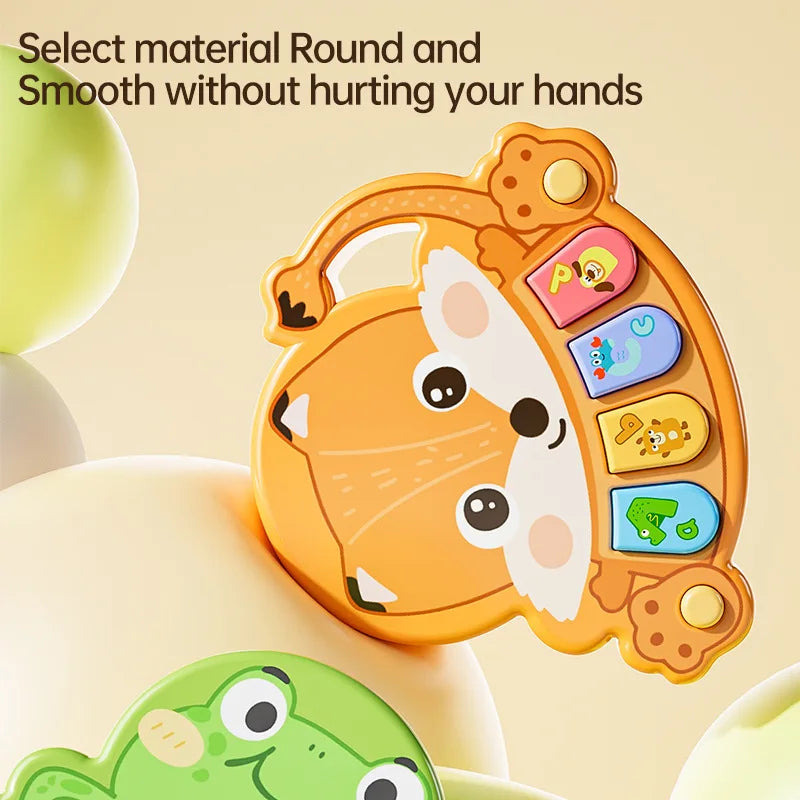 Close-up of a kids' animal piano toy showing detailed animal characters on keys.