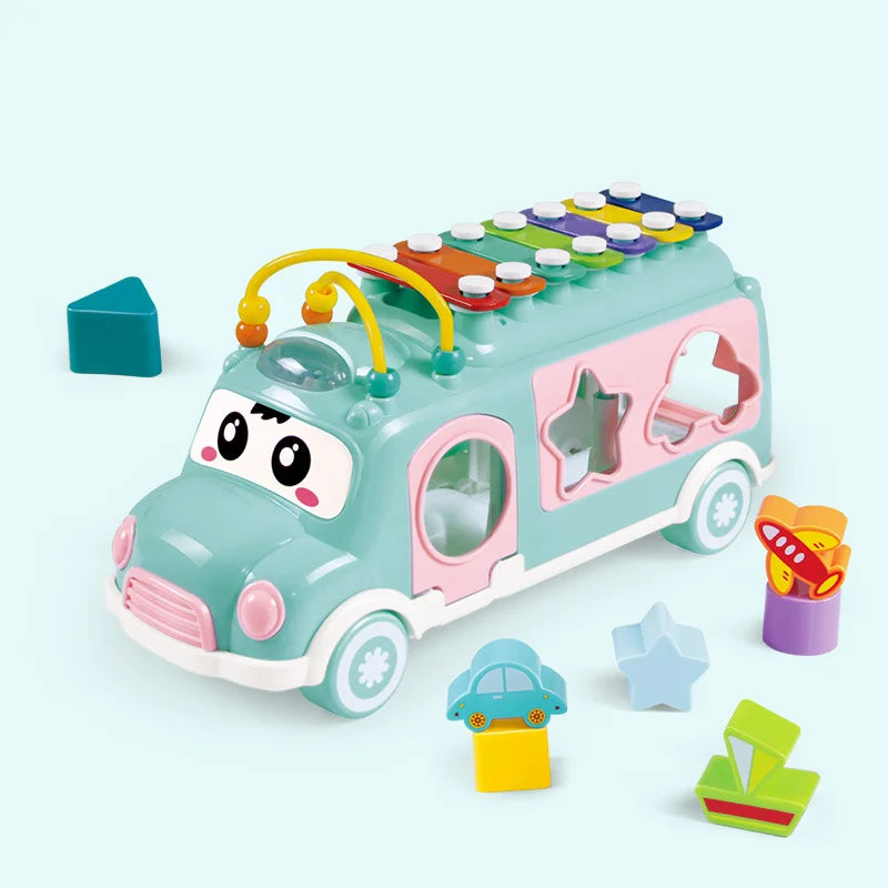 Interactive plastic bus toy with musical features, perfect for creative play and toddler learning.