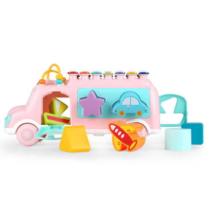 Vibrant bus-shaped musical toy for children, aids in motor skill development and auditory learning.